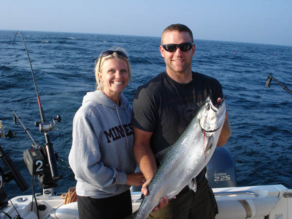 Nicki and Bob with Kings - Leprechaun Fishing Charters on Lake Michigan
