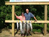 Tom and Nilka with their fish